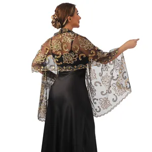 Back view of black mesh shawl with gold sequin lotus embroidery on evening gown.