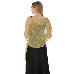 Back view of elegant gold floral sequined embroidery shawl with tassels for evening dress
