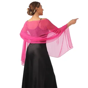 Back view of elegant pink sheer shawl draped gracefully over a black evening gown for weddings