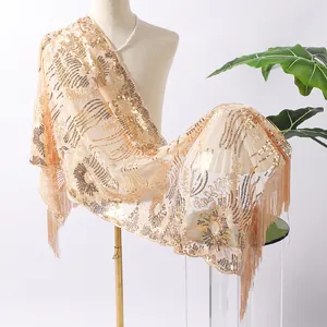 Elegant champagne shawl with gold sequin sunflower embroidery and fringes.