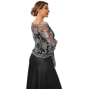 Close-up of elegant black sheer shawl with silver sequin embroidery decoration