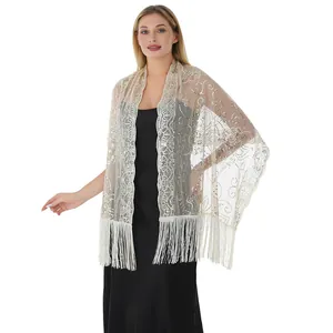 Châle élégant en résille à paillettes avec de longues franges pour robes de soirée chic.