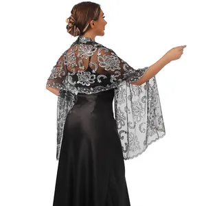 Detailed back view of an elegant silver lotus sequin embroidered evening shawl for women