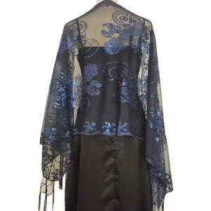 Detailed view of navy blue sequined shawl with elegant fringe for evening gowns and parties