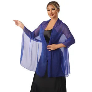 Close-up of lightweight blue sheer shawl showing crinkled fabric texture and drape
