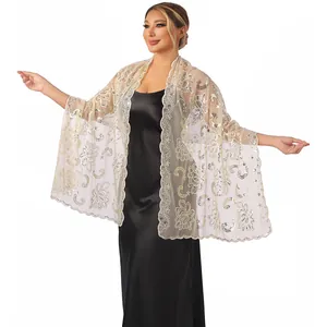 Detailed view of elegant champagne sheer mesh shawl with floral sequin embroidery