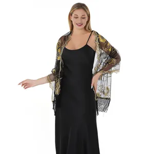 Elegant black mesh shawl with gold floral sequin embroidery and fringe for evening party
