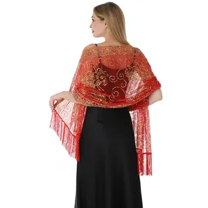 Vue détaillée de ce châle de soirée rouge avec paillettes dorées et longues franges