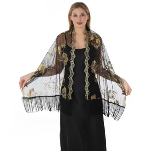 Elegant black mesh shawl with gold sequins floral embroidery and fringe for evening party.