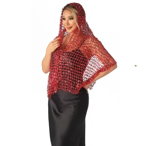 Detailed view of a vibrant red sequin shawl with elegant mesh pattern and starry glitters.