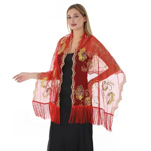 Detailed view of red sequin embroidered floral shawl with elegant long tassels for evening events