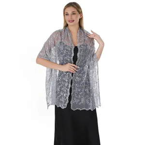 Detail of gray evening shawl with sequin phoenix embroidery for bridal and party dresses