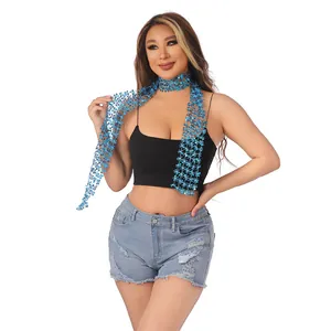 Detailed view of an elegant blue flower sequin scarf worn as a neck accessory on model