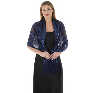 Detail view of navy blue sequined embroidered shawl with tassel fringe for evening dress