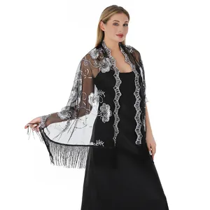 Elegant black mesh shawl featuring silver sequin floral embroidery and fringe tassels.