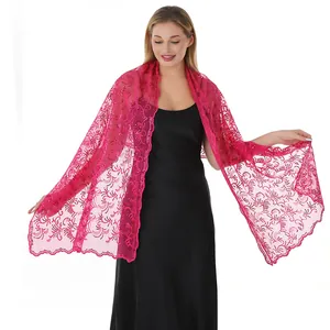 Detail of elegant hot pink shawl with phoenix tail sequin embroidery for evening dress