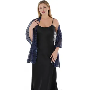 Macro detail of elegant navy blue shawl with floral sequin embroidery for evening dresses