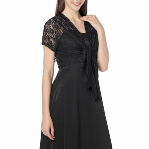 Detailed macro view of black floral lace shrug bolero with front tie for evening gowns