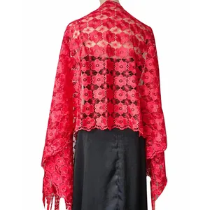 Close-up back view of red floral lace embroidered shawl with intricate patterns