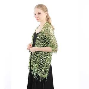 Detail showing elegant lime green sequin mesh shawl with fringe for evening gowns