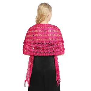 Detailed view of elegant magenta floral lace shawl with fringe for evening party dresses