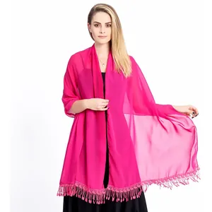 Elegant fuchsia chiffon evening shawl with delicate lace fringe trim on white background