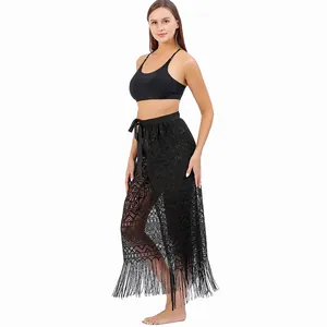 Full length side view of black lace beach wrap skirt with tie waist and fringe tassels
