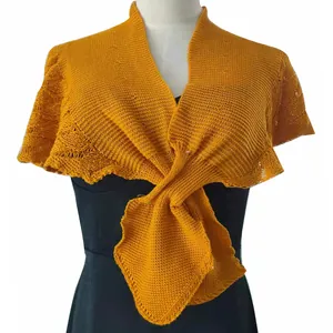 Front view of a yellow knitted shawl wrap for dresses showing the tie knot detail