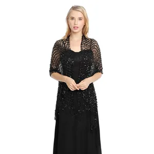 Close-up detail of elegant black sequined fringe shawl wrap for evening party dresses