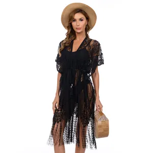 Cache-maillot en dentelle noire avec taille à cordon et ourlet à franges élégantes