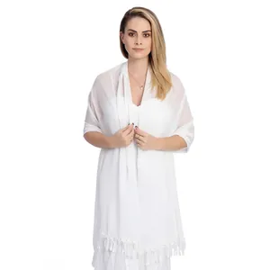 Elegant white chiffon bridal shawl with delicate lace trim fringe on a studio model