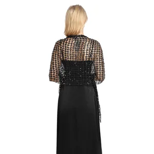 Detailed back view of a black sequin embroidered tassel shawl for evening party gowns