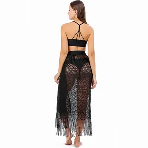 Back view of elegant black lace tassel beach cover-up skirt with geometric patterns
