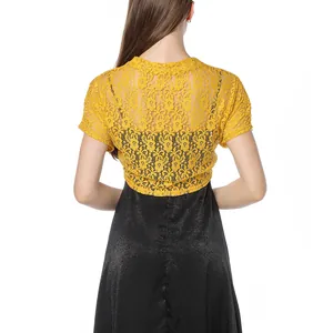Detailed back view of a yellow floral lace shrug bolero cardigan for elegant evening dresses