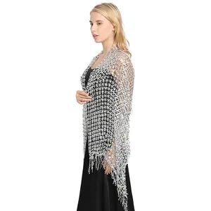 Detailed side view of elegant silver sequin fringed shawl wrap for evening party dresses