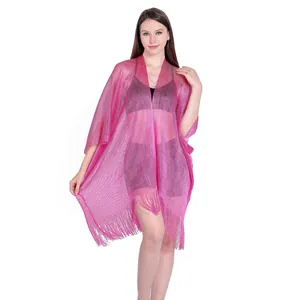 Shimmering metallic pink beach shawl with fringe detail, perfect bikini cover-up.