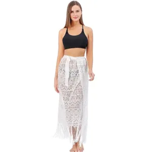 Elegant white lace beach wrap skirt with fringe detail and adjustable tie waist