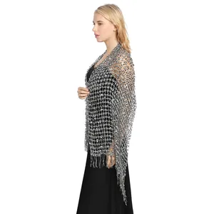 Detailed side view of silver sequined mesh shawl with elegant fringe tassels for parties