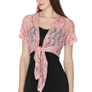 Detail view of pink floral lace shrug shawl with front tie-up design for dresses