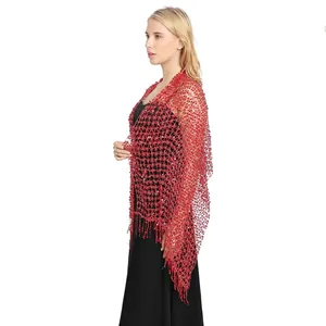 Side view of an elegant red sequined shawl with delicate fringe for evening dresses