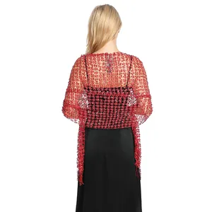 Back view of a red sequin fringe shawl paired with an elegant black evening dress
