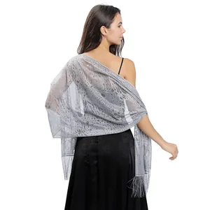 Detailed view of the elegant gray lace evening shawl with delicate floral patterns