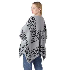 Detailed back view of a high-quality gray leopard print knit poncho shawl for women