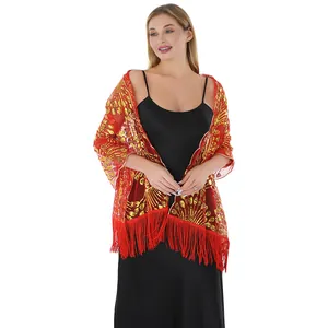 Detailed view of red peacock tail sequin embroidery and fringe on evening shawl wrap