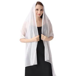 Elegant white chiffon shawl featuring silver silk threads and rhinestones on model