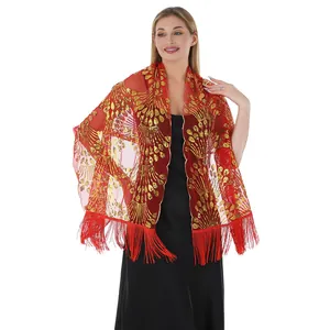 Elegant red mesh shawl featuring intricate gold peacock tail sequins and long fringe detail.