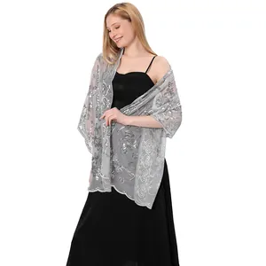 Elegant silver sequined shawl for bridal evening gowns and formal dress accessory.