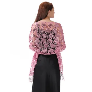 Detail of pink water-soluble lace shawl with sparkling sequins and paisley patterns