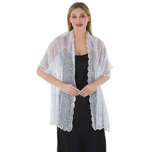 Elegant white bridal lace shawl with intricate sequin embroidery worn by a female model