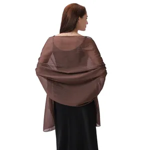 Detailed back view of a shimmering brown silk crepe evening shawl wrap for wedding party